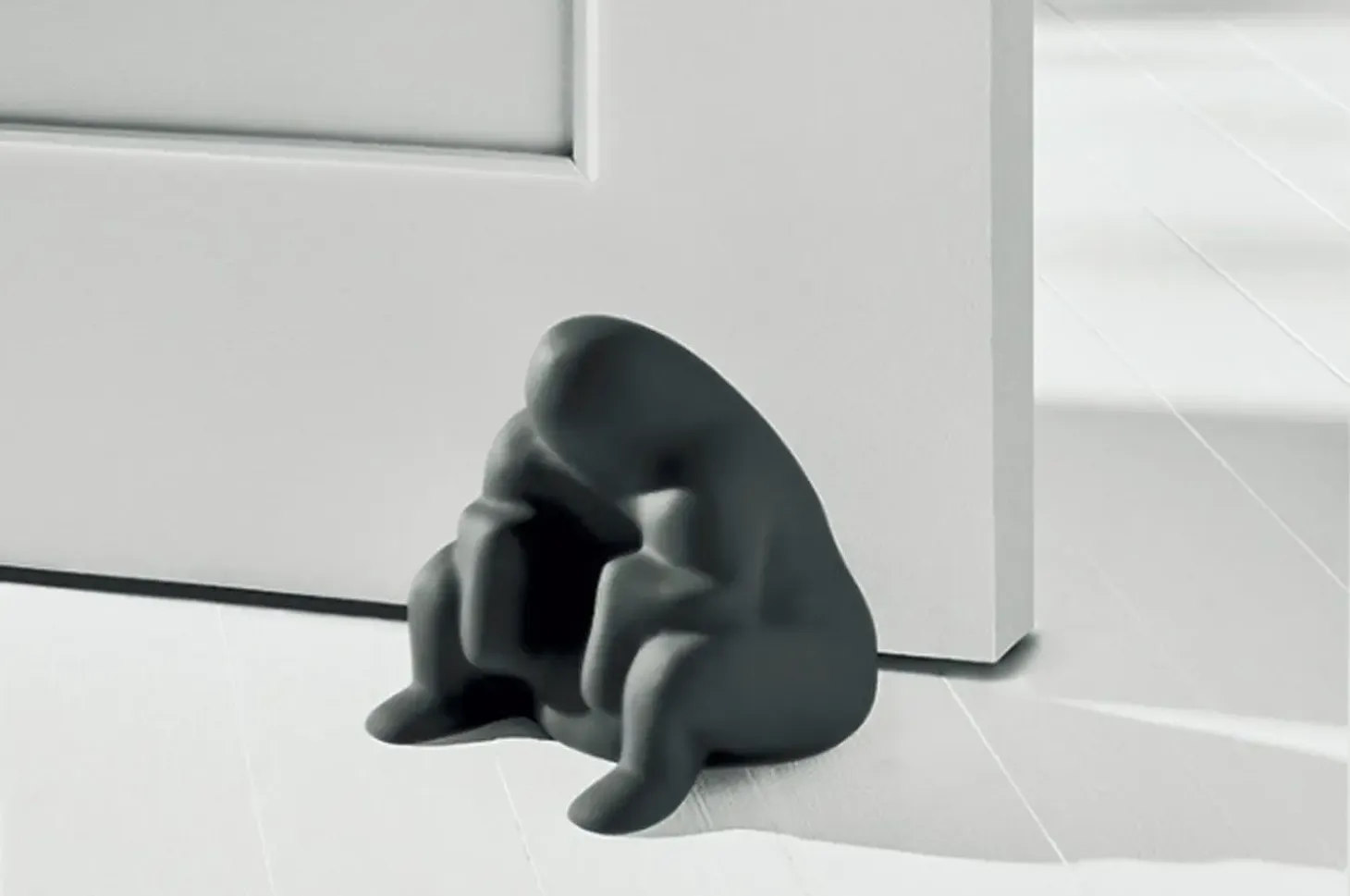 Alessi - Dédé dørstopper - Gulvdørstopper - Sort